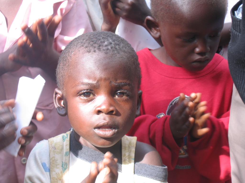 Children with praying hands